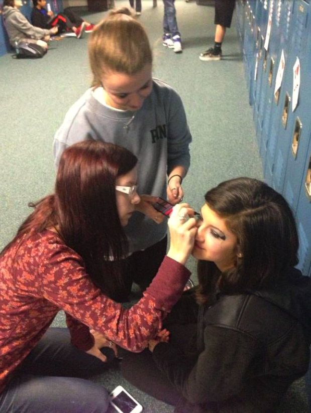 Coppell Middle School West eighth grade media students Gracie Webb and Lindsay Hopkins do Isy Martinez's makeup for her role as "The Screech" in their short film. Photo courtesy of Monica Champagne.