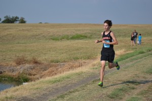 Senior Justin Armenta leads the JV boys at the Prosper Invitational, earning the team a first place finish overall. Photo by Elizabeth Sims.