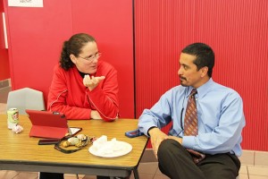 Michelle Kellen, current associate principal at Coppell High School, talks to Principal Mike Jasso during B lunch about upcoming events. Kellen is leaving Coppell High School at the semester. Photo by Nicole Messer. 