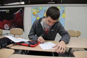 Senior Blake Simon studies for the upcoming Academic Decathlon state competition in San Antonio, which begins on Feb. 21. Photo by Sandy Iyer