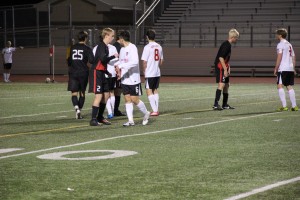 Coppell junior midfielder Drew Brinda positions himself to defend a corner kick from the Marcus Marauders in the teams' Feb. 14 match. Coppell defeated the Marauders 2-0 in the regional final match on Saturday, Apr. 12. Photo by Shannon Wilkinson.  
