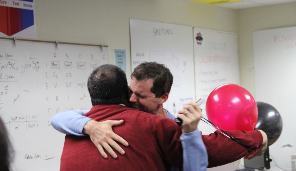 Teacher of the Year nominee Mike Yakubovsky embraces assistant principal Jeremy Varnell as he presents the nomination to him during fifth period today. 15 Coppell High School teachers were nominated for the award. Photo by Aubrie Sisk.