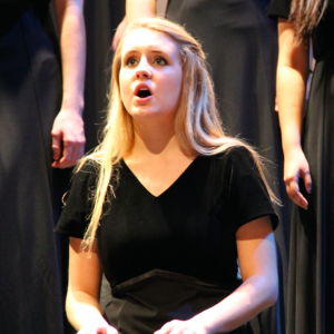 Coppell High School sophomore Amelia Vanyo performs during the fall choir show on Oct. 8. in the CHS auditorium. Vanyo is in the Kantorei group that performed “Turn Around” and “There Will Come Soft Rain”. 