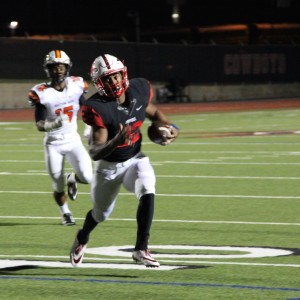 Coppell High School senior running back Brandon Rice runs the ball into the endzone scoring a touchdown for the Cowboys. Coppell High beat Haltom 44-6 Friday night at Buddy Echols Field. Photo by Megan Winkle