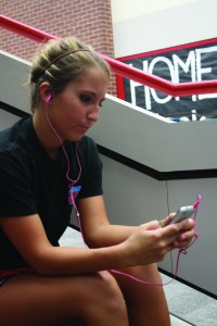 Senior Brittany Alvarado listens to music which all students are now allowed to do during lunch and passing periods.