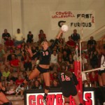 Senior Taylor Meade spiking the ball back over the net. (Photo by Katie Quill) 