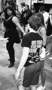 2008 CHS graduate Tiffany Cassius teaches Vivace students the choreography to "Sit Down You're Rocking the Boat"