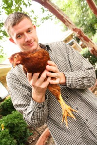 Micheal Vergien with one of his chickens