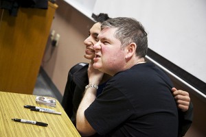 Jan. 30, After freshman Nick Jones' gets his book signed, he asks author Darren Shan if he could get his photo taken with the premier horror and fantasy fiction writer. Before the book signing, Shan spoke to both Coppell High School students and the Coppell ISD middle school students that gathered in the lecture hall to hear his presentation and ask questions on Wednesday. Shan is well known for writing The Saga of Darren Shan series as well as his Cirque Du Freak series. Photo by Rowan Khazendar.