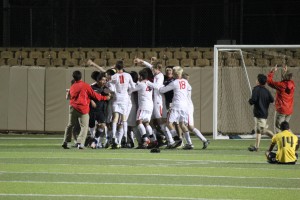 The Coppell Cowboys Soccer team celebrates after winning the 5A State Championship in overtime. Photo by Susie Shahsavari