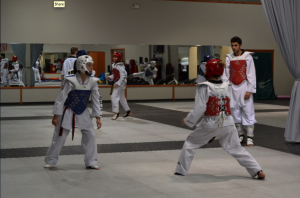 High school students participate in Taekwondo matches on Friday nights in Coppell at the National Taekwondo Association. Photo by Sandy Iyer.