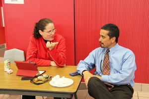 Michelle Kellen, current associate principal at Coppell High School, talks to Principal Mike Jasso during B lunch about upcoming events. Kellen is leaving Coppell High School at the semester. Photo by Nicole Messer.