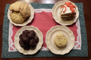 Student Life Editor Jena Seidemann showcases four recipes in her home for holidays, (clockwise) Easy cake cookie, Tomato soup cake, Apple Crisp muffins and Fudge balls. Photo by Jena Seidemann. 