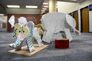 On Thursday, Monica Winters and Tamara Westervelt's AP 3D and IB art students display their elephant sculptures in the freshmen center, made out of various materials, after creating them for an art teacher conference at the Hilton Anatole Hotel. Photo by Alyssa Frost.