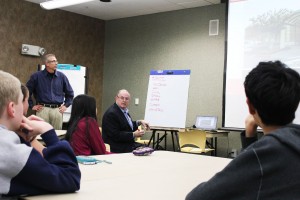 At the teen focus meeting on Jan. 30 at the William T. Cozby Public Library, architects Bill Hidell and Tony Blaas took notes as Coppell teens voiced their dislikes about the library. Photo by Nicole Messer.