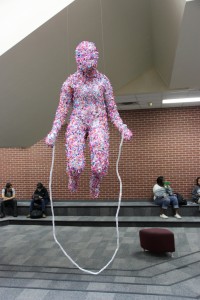 3D art students started displaying new art projects around CHS this week. This colorful sculpture of a person jump roping can be located hanging right in front of the pit. Photo by Sandy Iyer.