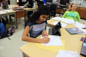 Senior Sree Lingam was one of the eight art students who earned a state medal at the VASE competition. Photo by Alyssa Frost