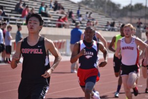 Freshman Alan Huo runs the 800-meter dash at Coppell relays on March 1.