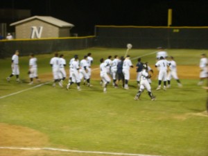 Nimitz celebrates its 5-2 victory over Coppell on Friday, May 2