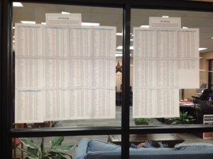 A student can find their EOC Biology testing room number on the Student Services' windows. Photo by Kara Hallam.