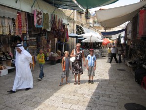 David Trakhtengerts (left) and Ran Trakhtengerts (right) walk through the streets of the Old City in Jerusalem with Livshits' mother in 2009. Photo courtesy of Natasha Livshits.  