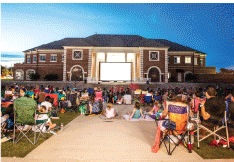 This Saturday, the City of Coppell will air E.T. in the Town Center Plaza. The film was chosen for this upcoming Movie Night in the Plaza in spirit of Halloween. Photo credit The City of Coppell.