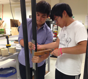 Juniors, Zane Erickson(left) and Neno Teruya(right), are working on their first mock up of the project, Gateways, Thursday in the STEM room. Photo by Gabby Sahm