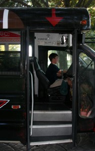 Junior Spencer Moore starts up the engine of BUSTER 2.0 and is the main driver of the bus. Moore did not have to receive a special license to drive the bus, he is perfectly able to drive it with his class C driver's license.  The bus is named BUSTER 2.0 after a bus his brother tried to contribute to the student section last year, BUSTER, fell through. The bus also gets its name from combining a common name with the term bus. Photo by Tuulia Koponen.