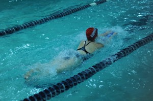 Senior swimmer Sarah Zeh swims a lap at the YMCA during first period on October 9. Phot by Sarah VanderPol.