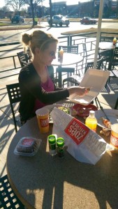 Coppell resident begins to pack leftovers to go on the patio of Zoë's Kitchen, located on 120 S. Denton Tap Suite 490 Coppell TX.  75019. Photo by Chloe Moino