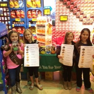 Troop 4887 Girl Scouts Audrey, Lucia, Anna and Gaby sell cookies at the local Tom Thumb Saturday afternoon. According to them Thin Mints and Samoas are the best sellers. Photo by Aubrie Sisk.