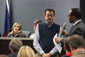 Coppell Independent School District held their board of trustees meeting Thursday night. Board member Anthony Hill talks with Coppell high school band director Scott Mason after a few of his musicians and recognized. Photo by Chelsea banks
