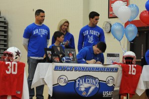 Senior Bryce VonZurmehlen is one of three Coppell athletes attending the United States Air Force Academy. He is pictured with his family as he signs his letter of intent at CHS on Feb. 4. Photo by Sarah VanderPol.