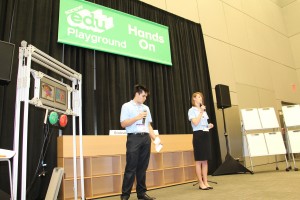 Junior Zane Erickson (left) and Senior Erin Payne (right) speak to the crowd at SXSWedu about their teams innovation Gateways. Photo courtesy Ruth Fernandes.