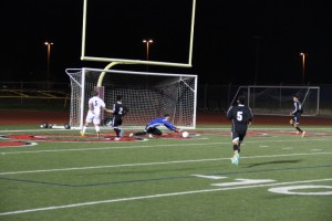 Junior midfielder Scott Simigan (no. 23) anticipates a corner kick in the first half of Friday night's game at Buddy Echols field. Coppell defeated Haltom 7-0. Photo by Mallorie Munoz.