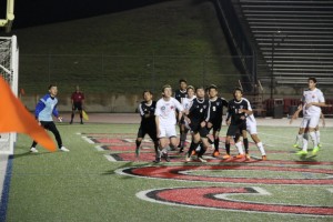Junior Tanner Traw takes a shot during the first half on Friday night at Buddy Echols Stadium. Coppell won 7-0 in their final game of the season. Photo by Mallorie Munoz.