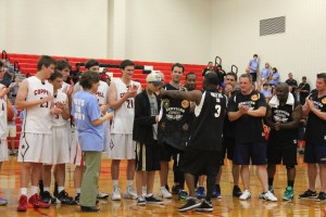 Gantt is honored at the 2014 Hoops for Tommy game by the Coppell fire and rescue forces. Gantt passed away Saturday April 4 after a two year fight with cancer. Photo by Nicole Messer.