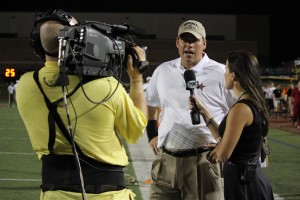 Coach Joe McBride talks to the media after Coppell's 68-20 win over Rockwall on Sept. 13, 2014. McBride was announced as the new athletics director on April 8.