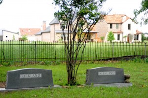 Headstones at Coppell's Bullock Cemetery are overshadowed by recent development. Photo by Sarah VanderPol.