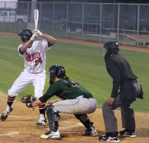 Junior first baseman Marco Navarro hits against a Southlake Carroll pitcher in Coppell's 3-2 win over the Dragons on March 27. Photo by Aubrie Sisk.