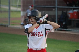 Sophomore center fielder Mia Hermans focuses on the pitcher as she gets ready for her at-bat. Hermans scored a run in the 6-2 Cowgirl win. Phot by Kelly Monaghan.