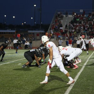 Senior wide receiver Josh Fink lines up in the red zone in the Cowboys' week one win over Hebron. Fink finished with 10 catches for 160 yards and a touchdown. Photo by Aubrie Sisk.