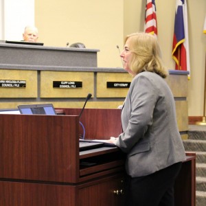  Mayor Karen Hunt is asked to consider the approval of an Ordinance of the City of Coppell approving the budget for the most recent Fiscal Year. Amendmenst to Ordinance No. 2014-1394 as well as Ordinance No. 94643 were approved by Mayor Karen Hunt. Photo by Kelly Monaghan.