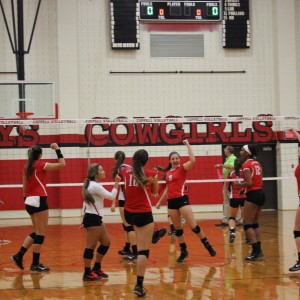 By Mallorie Munoz Managing Editor @munoz_mallorie With 15 wins and six losses so far this season, it came as no surprise that the Coppell Cowgirls won against the Burleson Lady Elks 25-14, 25-16, 25-20.   Although they took the win after three sets, the third set did not look favorable until the last five minutes.   Game one ended quickly with confidence felt throughout the team and audience, with the Lady Elks more than ten points behind. By the second game it was clear that the Cowgirls could take the win after three games if they kept their performance up. With two timeouts called, and two hits to the face taken by the opposition, the Lady Elk’s discouragement was seen and the end of the match felt near. Deciding to try a new offensive play, the Cowgirls played the third set in a 5-1 rotation, rather than the 6-2 rotation seen in the first two games. The change in plays was evident, leaving Burleson trailing one point behind Coppell for most of the set due to serve-receive errors on the Cowgirl’s part. At one point the teams flipped roles, and Coppell trailed behind Burleson.   “Offensively we are trying to do some new things, trying some new combinations” Coppell head coach Julie Green said. Towards the end of the match, with the Cowgirls in the lead 19-17, the first timeout was called by Coppell. After this, Coppell came back and pulled out a win. Senior outside hitter Jamie Stivers took the winning kill. “It took us a little bit of time to settle into it, but that is going to happen when you are trying something new” Green said.   In their next matchup, the Cowgirls will play the Grapvine Lady Mustangs at home on Sept. 4 at 6:30 p.m.