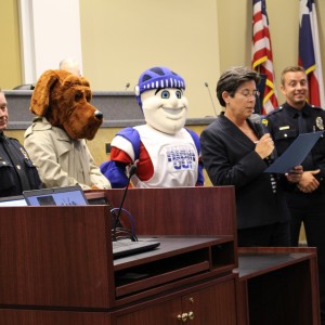 Mayor Karen Hunt approves a proclamation naming Tuesday, Oct. 6, 2015, as "National Night Out."  Her approval gave the City Council's support and endorsement of all National Night Out festivities in Coppell. Photo by Kelly Monaghan.