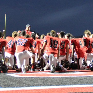 Coppell High Schools JV Red team comes together during halftime Sept. 24 at Buddy Echols Field. The Cowboys defeated L.D. Bell 31-0. 