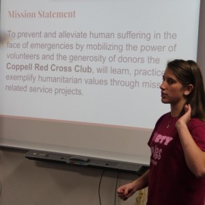 Coppell High School senior Nadia Mathis explains the mission statement of the Coppell Red Cross Club during its first meeting on Tuesday. Mathis serves as the vice president of the club and is responsible for service projects for the armed forces. Photo by Ayoung Jo.