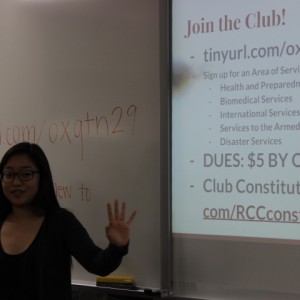 Coppell High School junior Tara Park explains the different areas of service that the Coppell Red Cross Club plans to focus on this year during the club’s first meeting on Tuesday. The areas of service include health and preparedness, biomedical services, international services, services to the armed forces and disaster services. Photo by Ayoung Jo. 