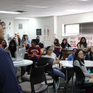 Coppell High School senior Saman Hemani introduces herself to the new members during the first meeting of the Coppell Red Cross Club on Tuesday. The meeting had a turnout of more than 30 students. Photo by Ayoung Jo.