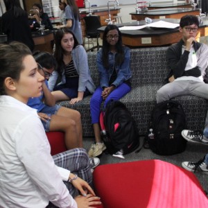 Coppell High School senior Anna Kustar shares her ideas for future service projects with her group during the Coppell Red Cross Club meeting on Tuesday. Kustar is a returning member of the club and specializes in international services. Photo by Ayoung Jo. 